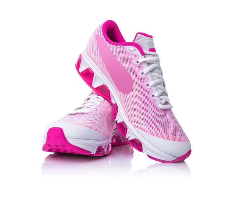 A clipping path service provider created reflection shadows of pink color shoes